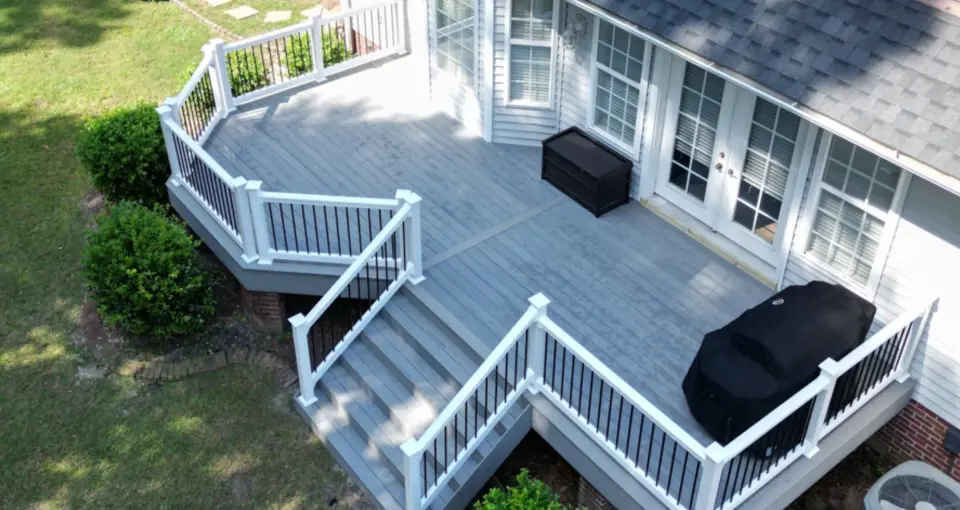 Aerial view of the composite deck with covered furniture in wilmington nc