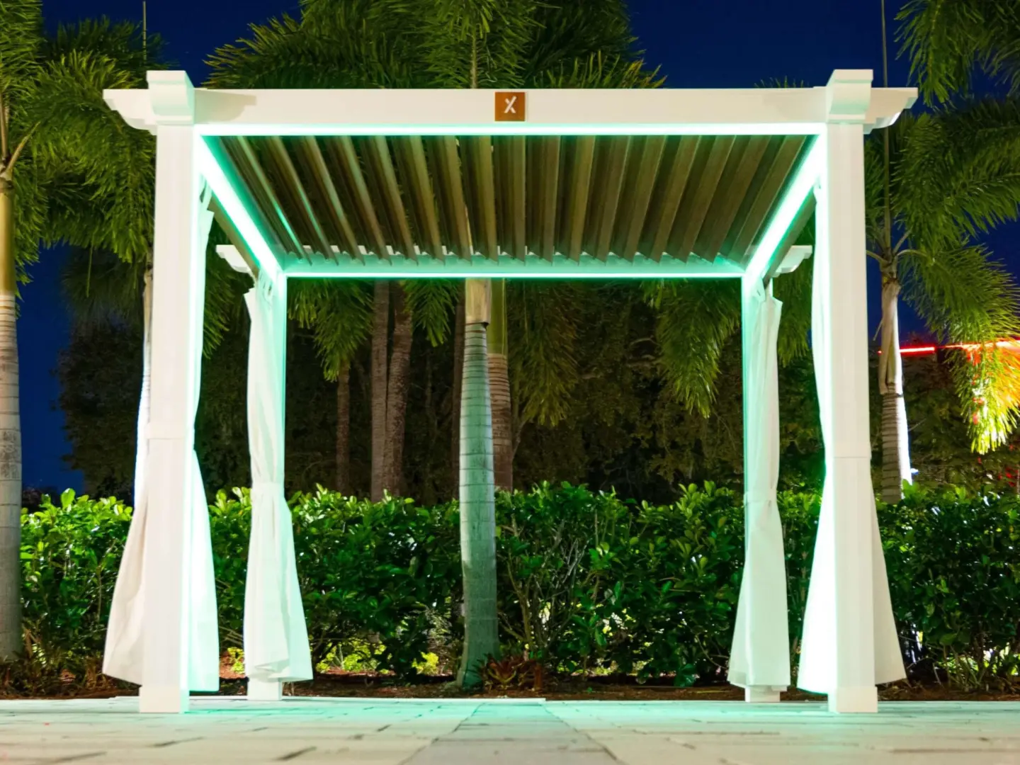 Cabana with trees and plants on the background