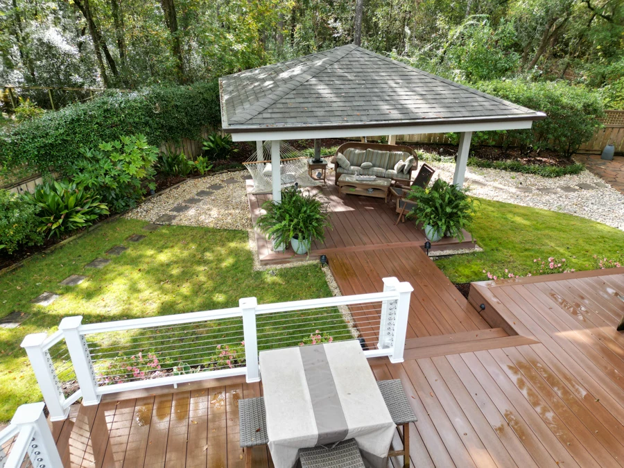 Custom decking with wire railing and porch outdoor living places on the wilmington