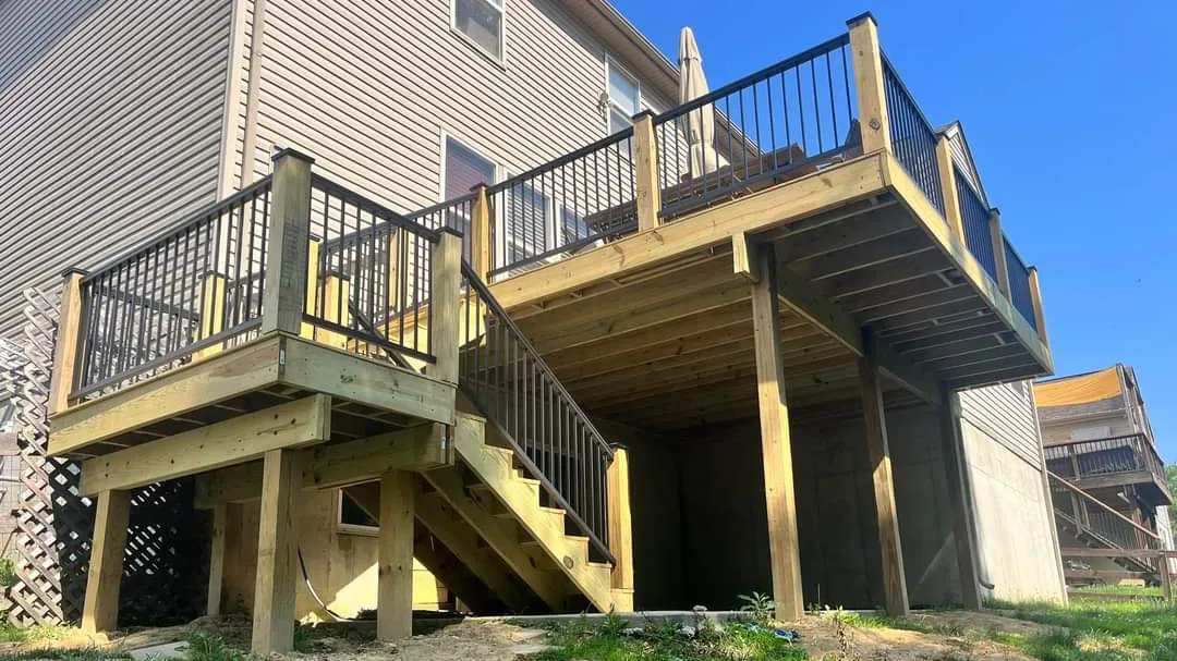 Elevated deck with outdoor furniture and metal deck railing on the wilmington