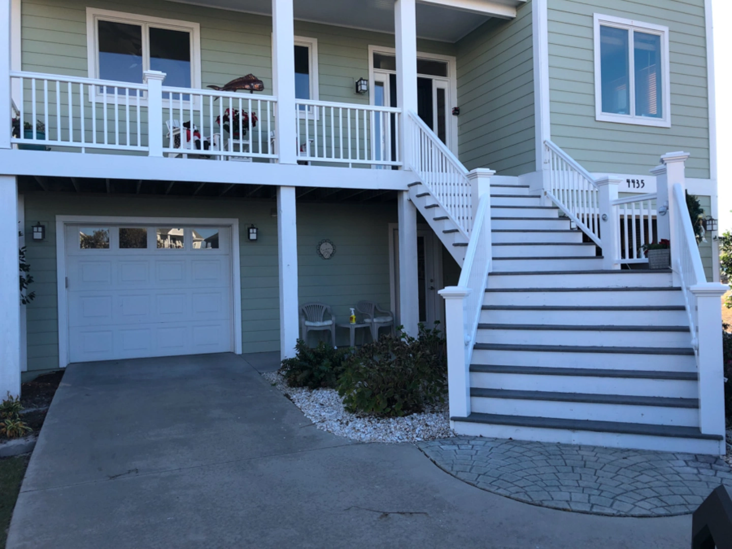 Elevated deck with white railing on the wilmington