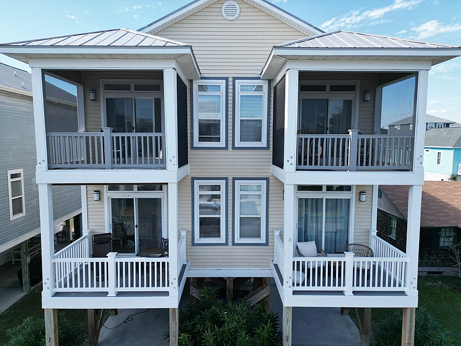 Front view of the big house with 2 screened porch and 2 open porch in wilmington nc