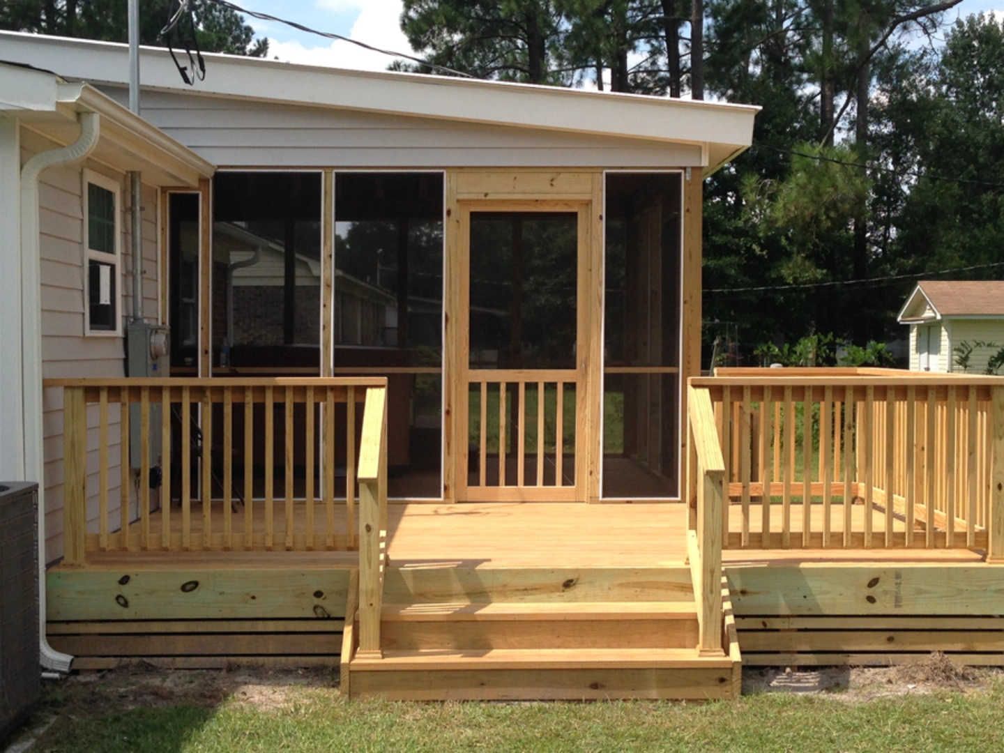 Front view of the deck framing with a screened porch in wilmington nc