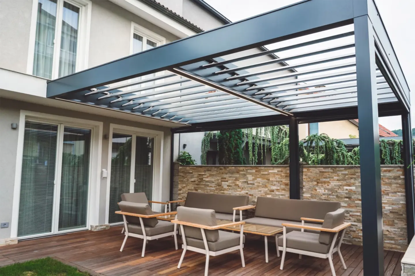 Louvered pergola with chairs and table in wilmington nc