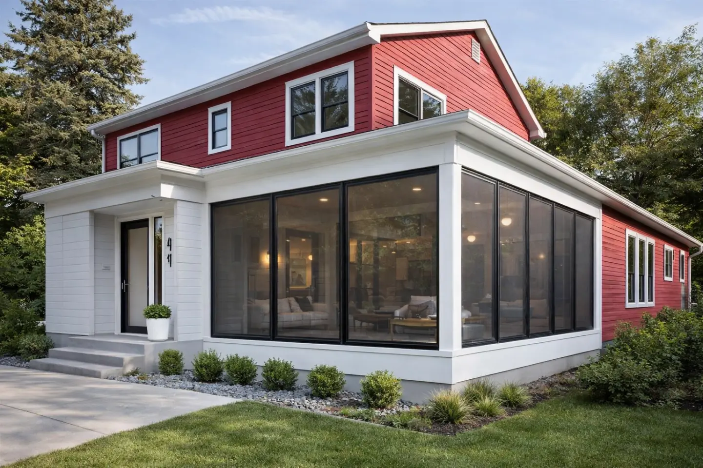 Red house with a porch enclosure in wilmington nc