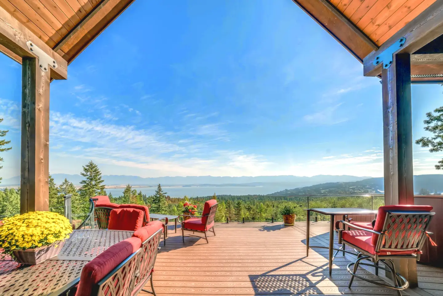 Stock outdoor patio with beautiful view of lake and mountains