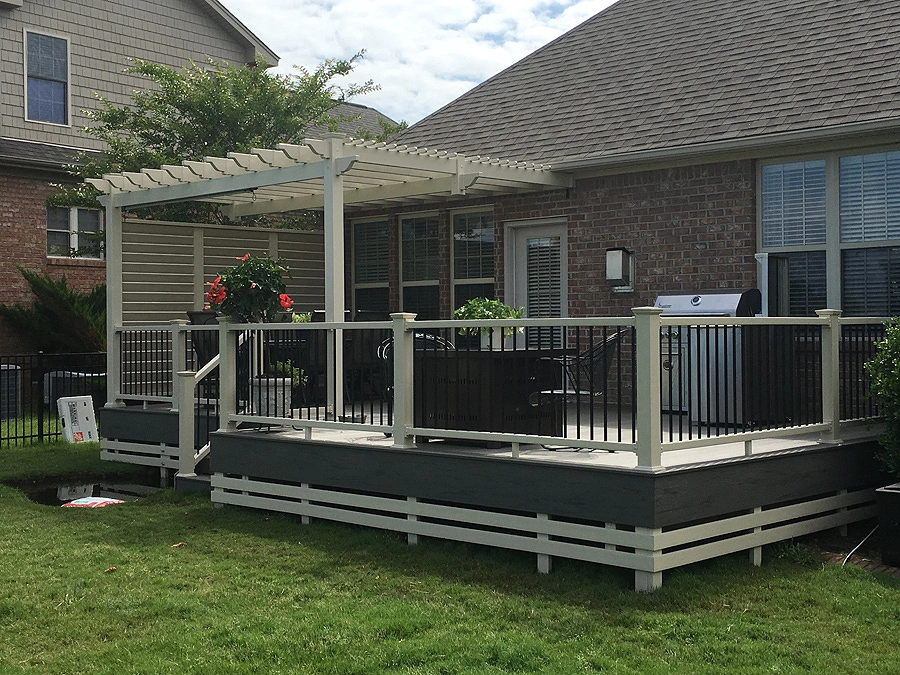 Wood deck railing installation with pergola and outdoor kitchen in wilmington nc